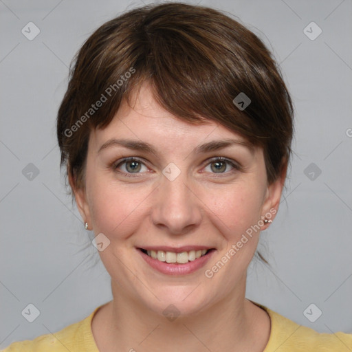 Joyful white young-adult female with medium  brown hair and grey eyes