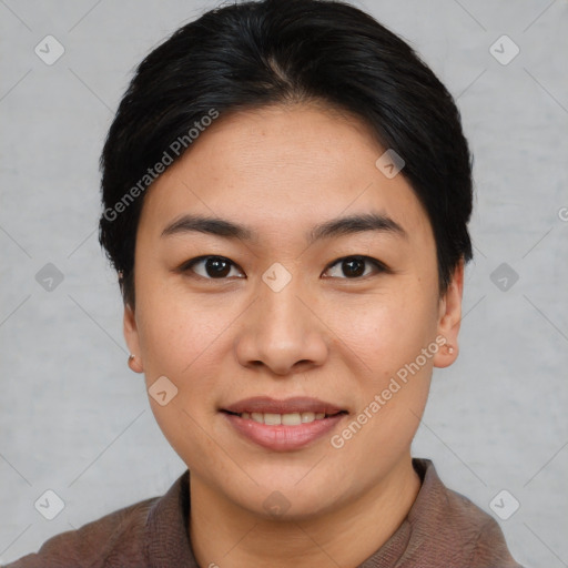 Joyful asian young-adult female with short  brown hair and brown eyes