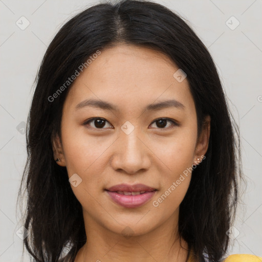 Joyful latino young-adult female with long  brown hair and brown eyes