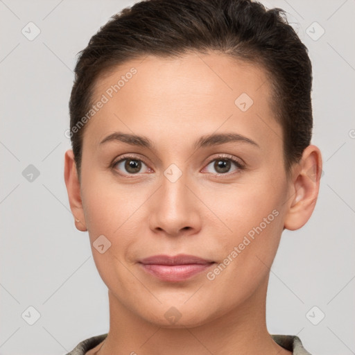 Joyful white young-adult female with short  brown hair and brown eyes