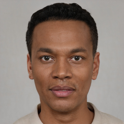 Neutral black young-adult male with short  black hair and brown eyes