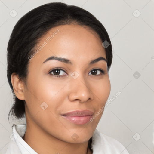 Joyful latino young-adult female with medium  brown hair and brown eyes