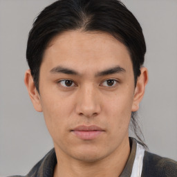 Neutral asian young-adult male with short  brown hair and brown eyes