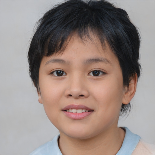 Joyful asian child female with medium  brown hair and brown eyes
