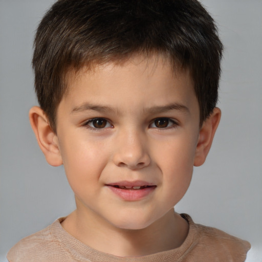 Joyful white child male with short  brown hair and brown eyes