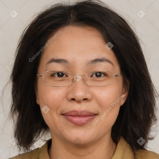 Joyful white adult female with medium  brown hair and brown eyes