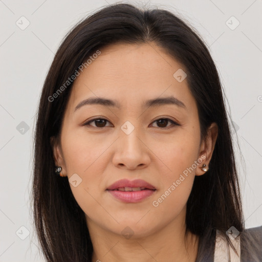 Joyful asian young-adult female with long  brown hair and brown eyes