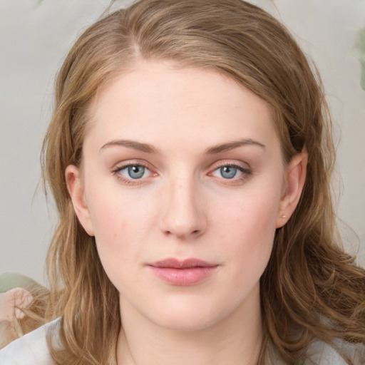 Neutral white young-adult female with long  brown hair and blue eyes