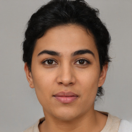 Neutral latino young-adult female with short  brown hair and brown eyes