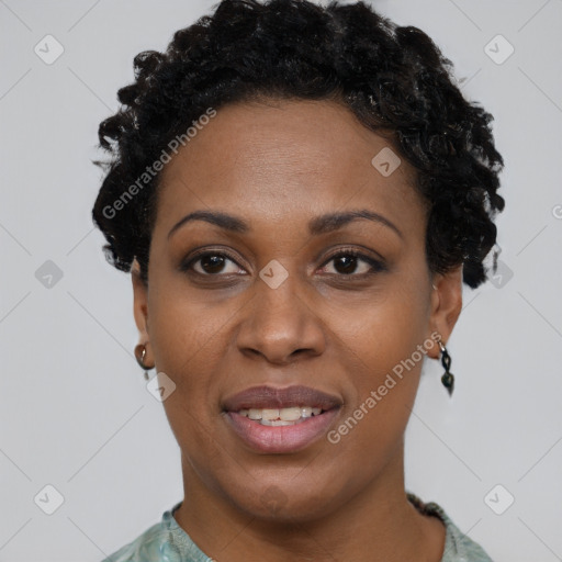 Joyful black young-adult female with short  black hair and brown eyes