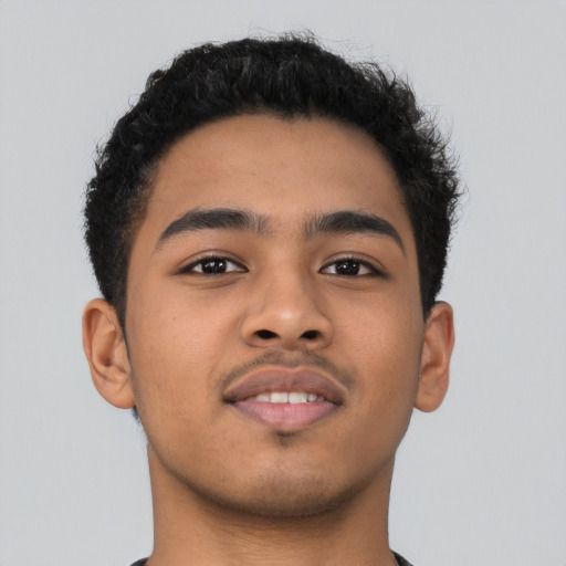 Neutral latino young-adult male with short  brown hair and brown eyes