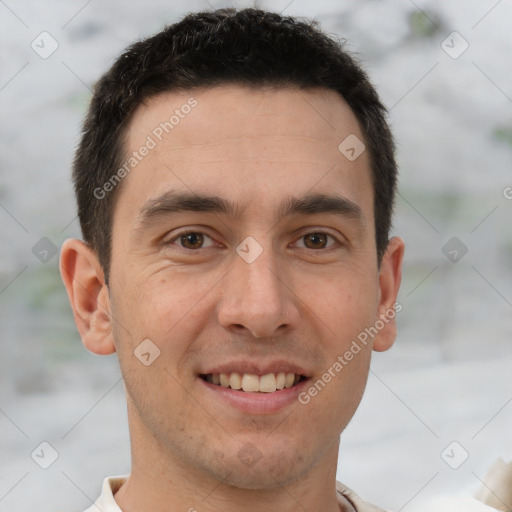 Joyful white young-adult male with short  brown hair and brown eyes