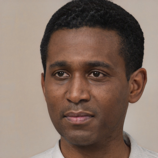 Neutral black young-adult male with short  black hair and brown eyes
