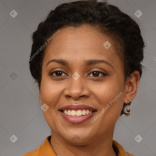 Joyful latino young-adult female with short  brown hair and brown eyes