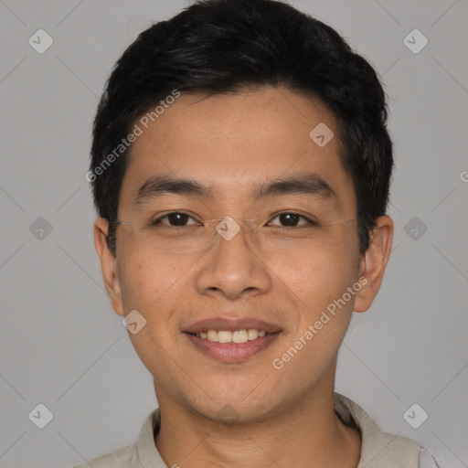 Joyful asian young-adult male with short  black hair and brown eyes