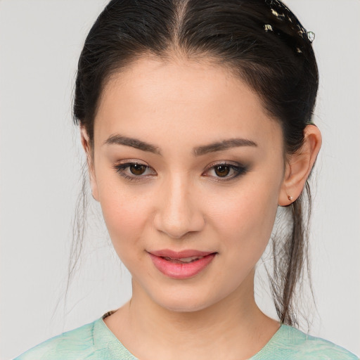 Joyful white young-adult female with medium  brown hair and brown eyes