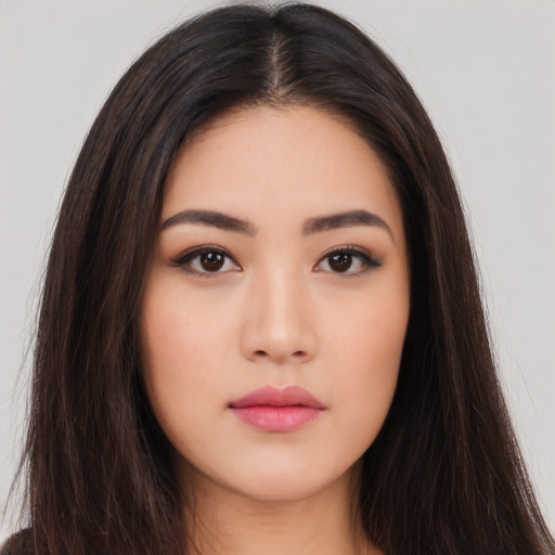 Neutral asian young-adult female with long  brown hair and brown eyes