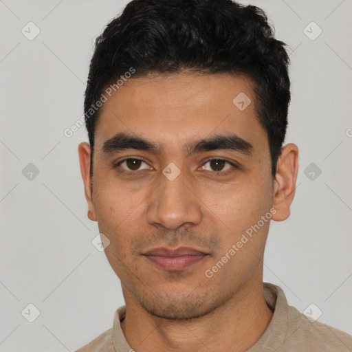 Neutral latino young-adult male with short  black hair and brown eyes