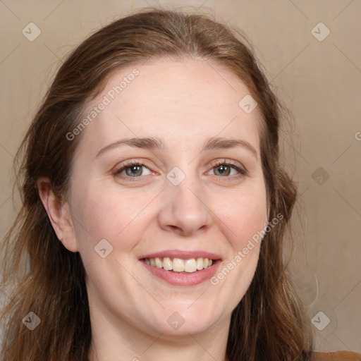 Joyful white young-adult female with long  brown hair and grey eyes