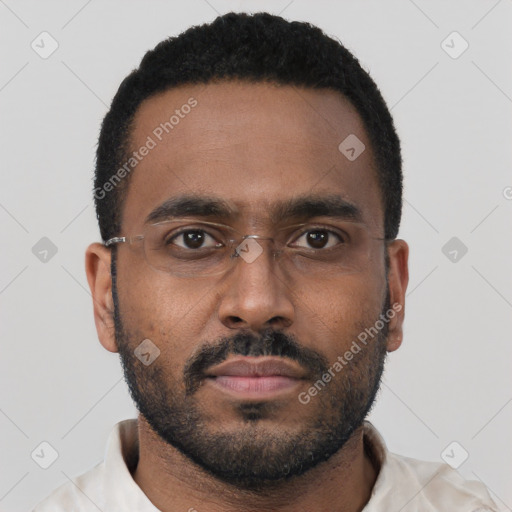 Neutral black young-adult male with short  black hair and brown eyes