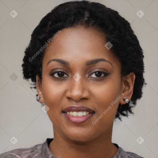 Joyful black young-adult female with medium  black hair and brown eyes