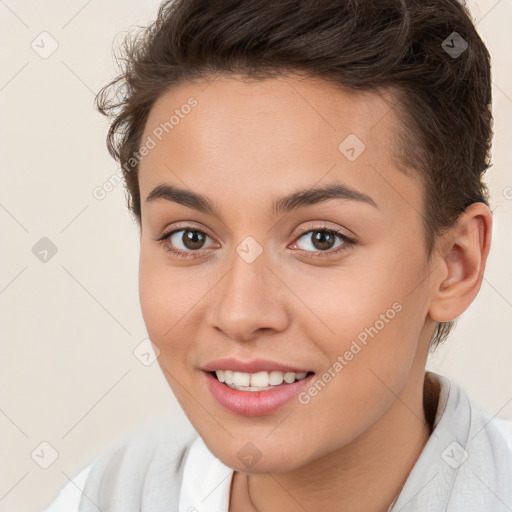 Joyful white young-adult female with short  brown hair and brown eyes