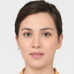 Neutral white young-adult female with short  brown hair and brown eyes