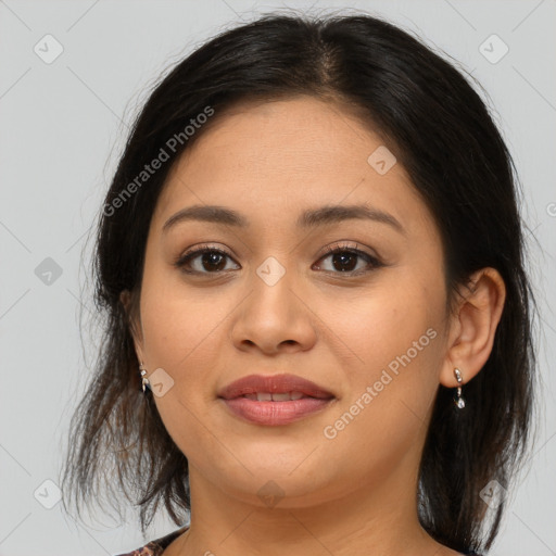 Joyful asian young-adult female with medium  brown hair and brown eyes