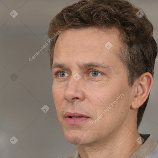 Neutral white adult male with short  brown hair and brown eyes