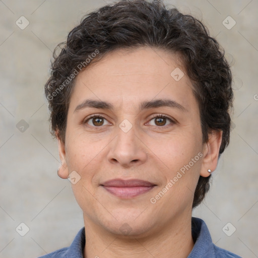 Joyful white adult female with short  brown hair and brown eyes