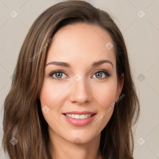 Joyful white young-adult female with long  brown hair and green eyes