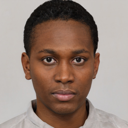 Neutral black young-adult male with short  black hair and brown eyes