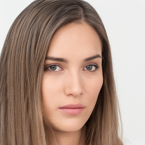 Neutral white young-adult female with long  brown hair and brown eyes