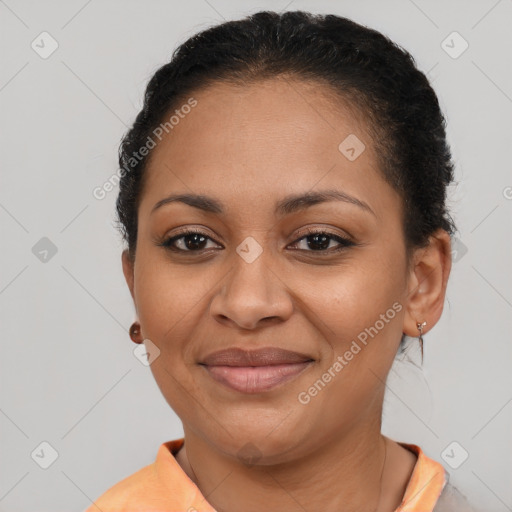 Joyful latino young-adult female with short  brown hair and brown eyes