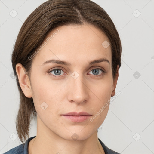 Neutral white young-adult female with medium  brown hair and grey eyes