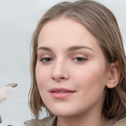 Neutral white young-adult female with long  brown hair and grey eyes