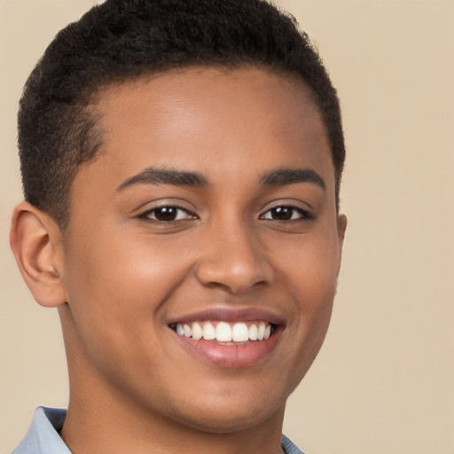 Joyful latino young-adult male with short  brown hair and brown eyes