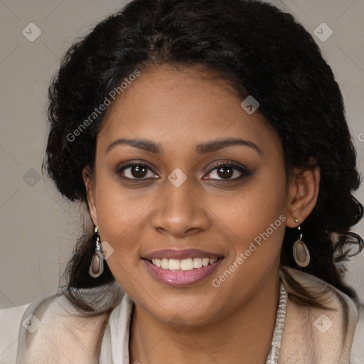 Joyful black young-adult female with long  brown hair and brown eyes