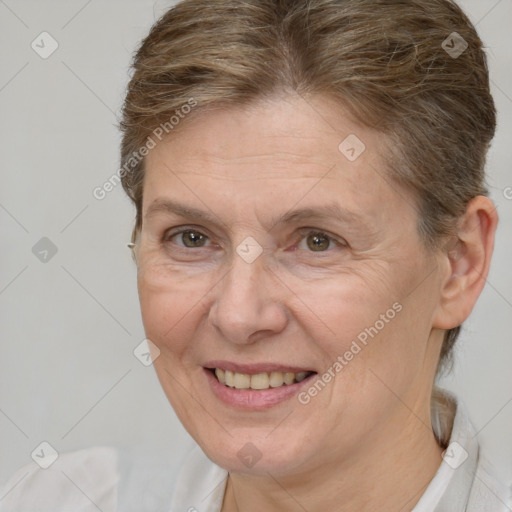 Joyful white adult female with short  brown hair and brown eyes