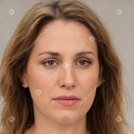 Joyful white young-adult female with long  brown hair and green eyes