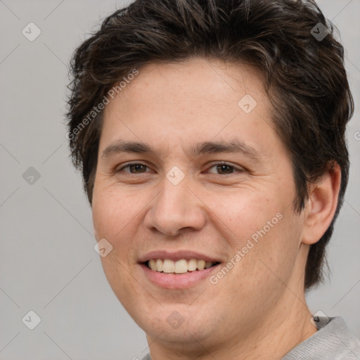 Joyful white adult female with short  brown hair and brown eyes