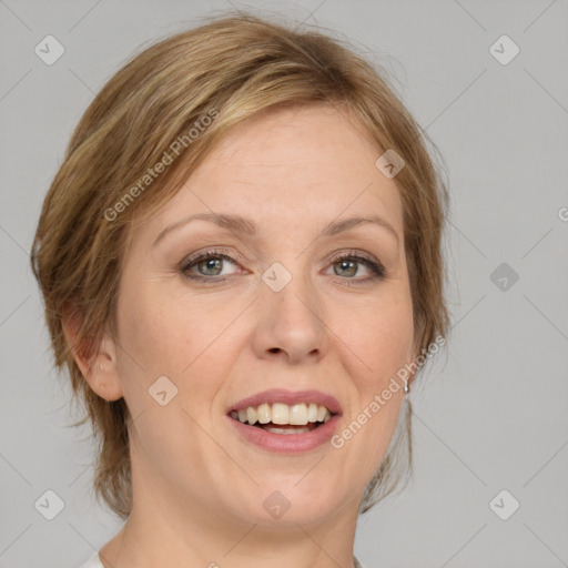 Joyful white adult female with medium  brown hair and green eyes