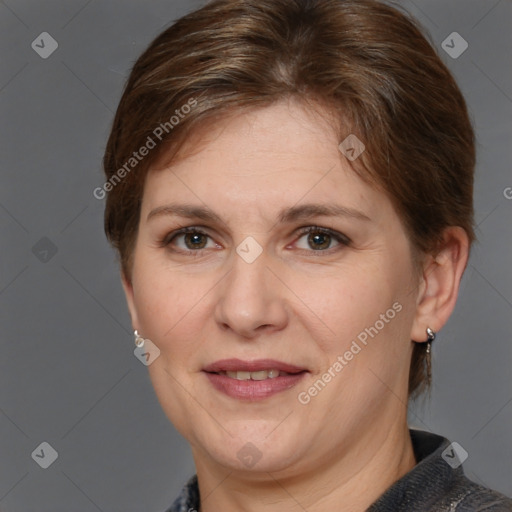 Joyful white adult female with short  brown hair and grey eyes