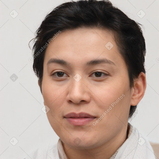 Joyful asian young-adult female with short  brown hair and brown eyes