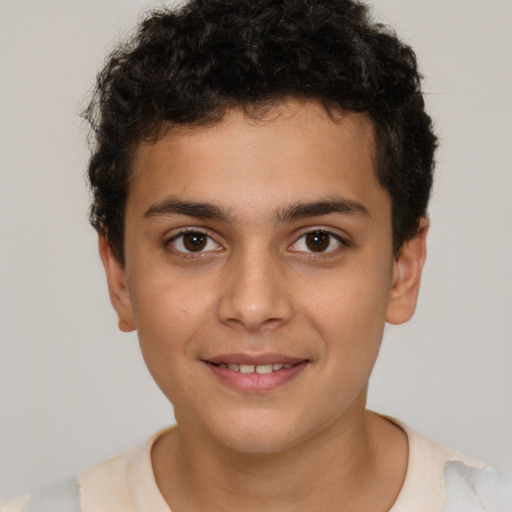 Joyful white child male with short  brown hair and brown eyes