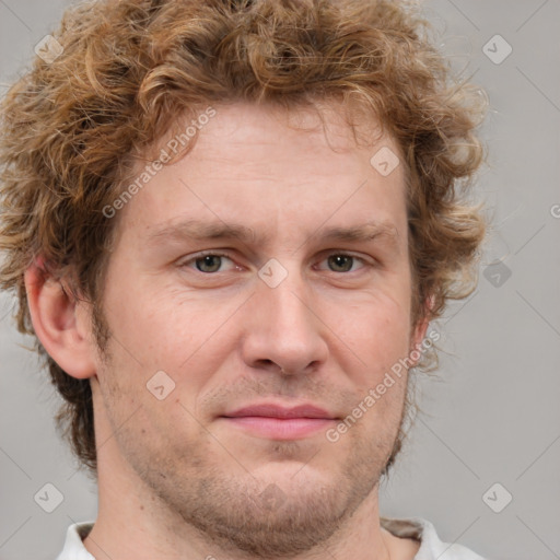 Joyful white adult male with short  brown hair and grey eyes