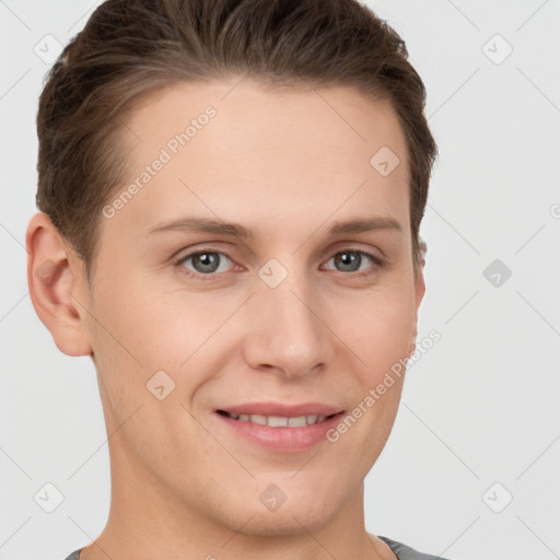 Joyful white young-adult female with short  brown hair and grey eyes