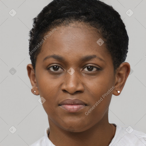 Joyful black young-adult female with short  brown hair and brown eyes