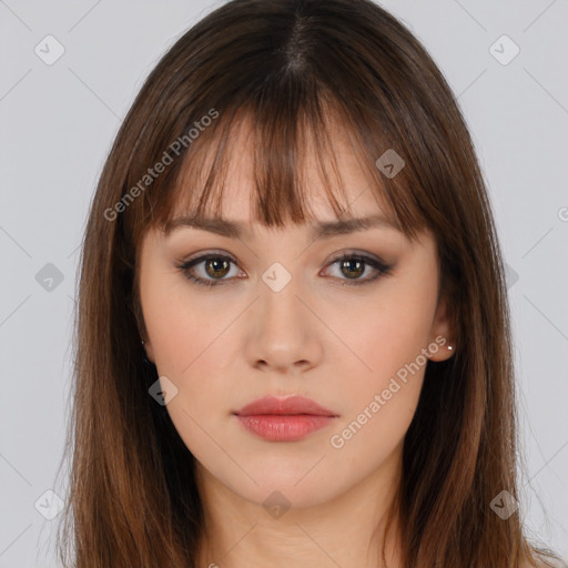 Neutral white young-adult female with long  brown hair and brown eyes