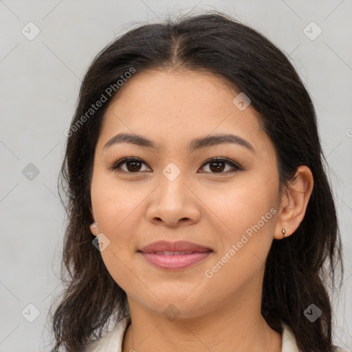 Joyful white young-adult female with long  brown hair and brown eyes